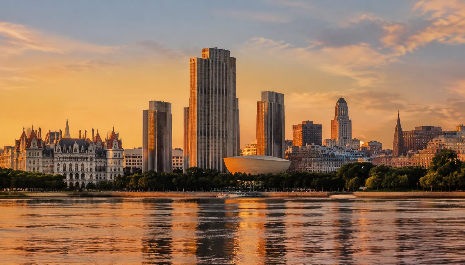The Albany, NY skyline at sunset across the Hudson River